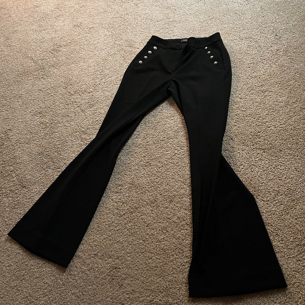 White House black market brand size 4.  Pearl button trim. Boot cut black